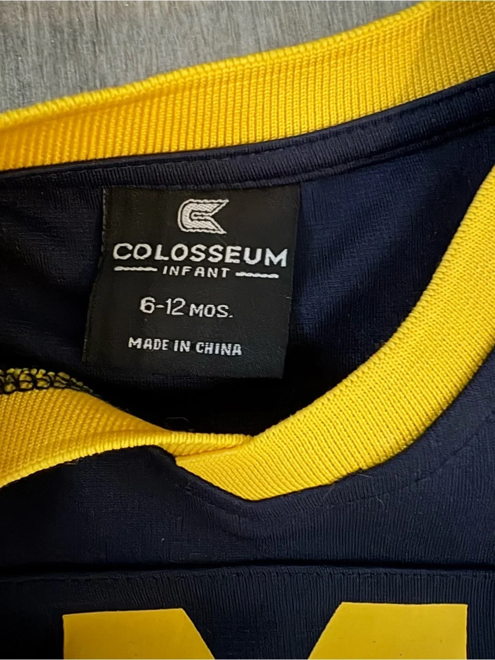 Colosseum Michigan Navy and Yellow Baby One-Piece Bodysuit